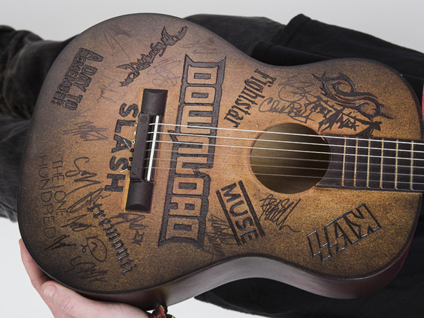 Acoustic guitar carved by Ben Woodward