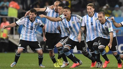 Argentina celebrate after winning their semi-final