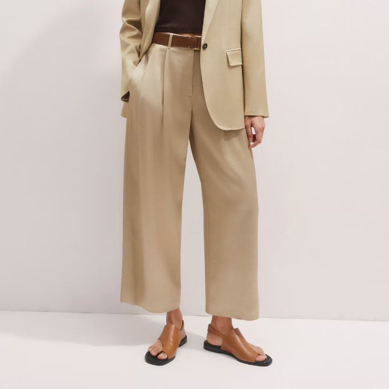 Image of gold wide leg trousers