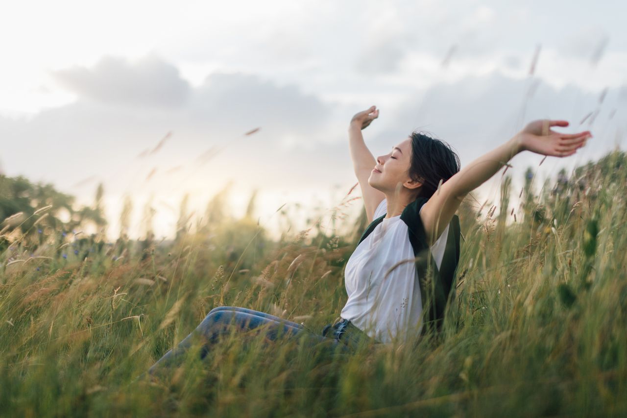 A woman with PCOS enjoying some fresh air