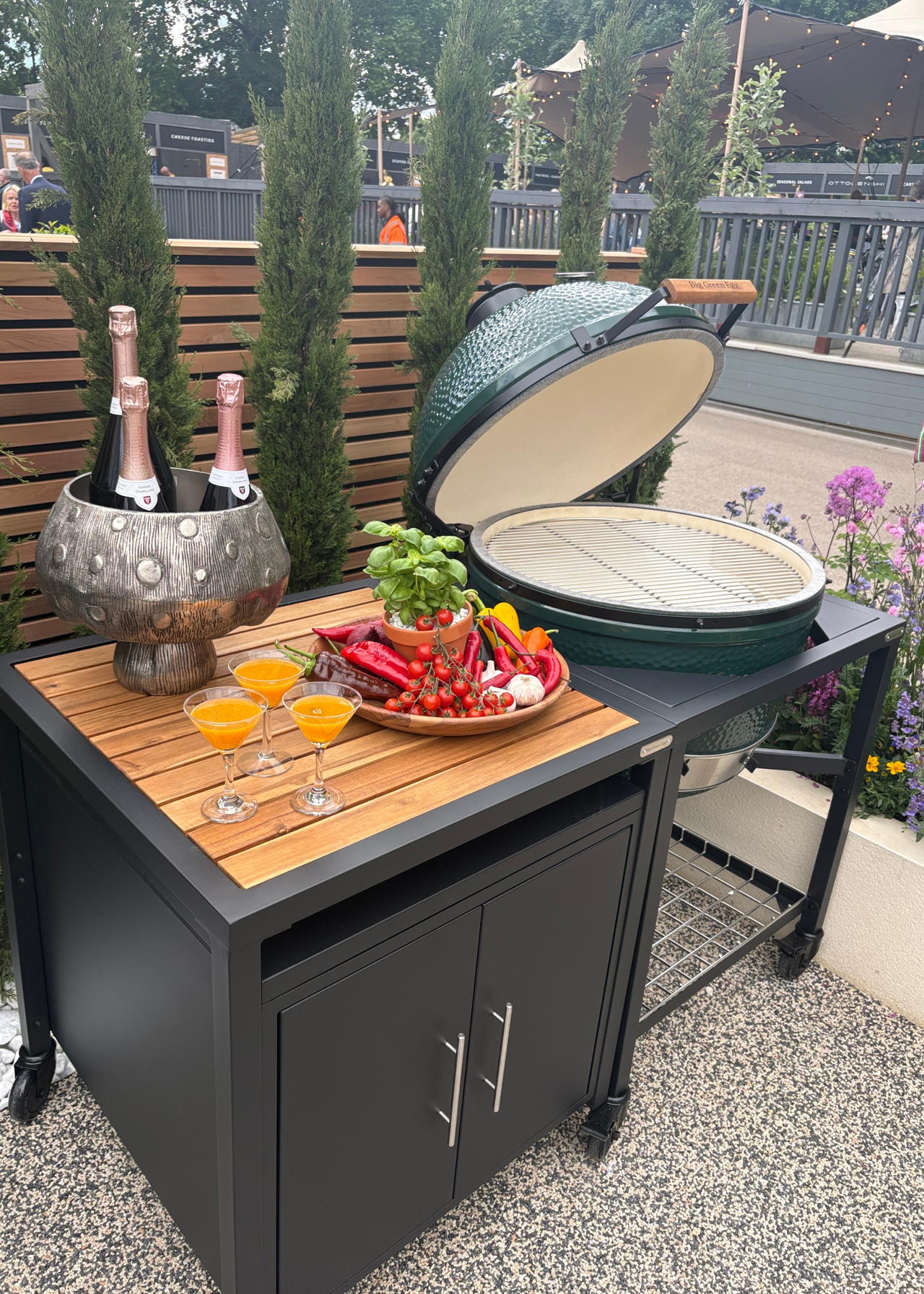 An outdoor cooking island with a Big Green Egg at the Chelsea Flower Show 2026