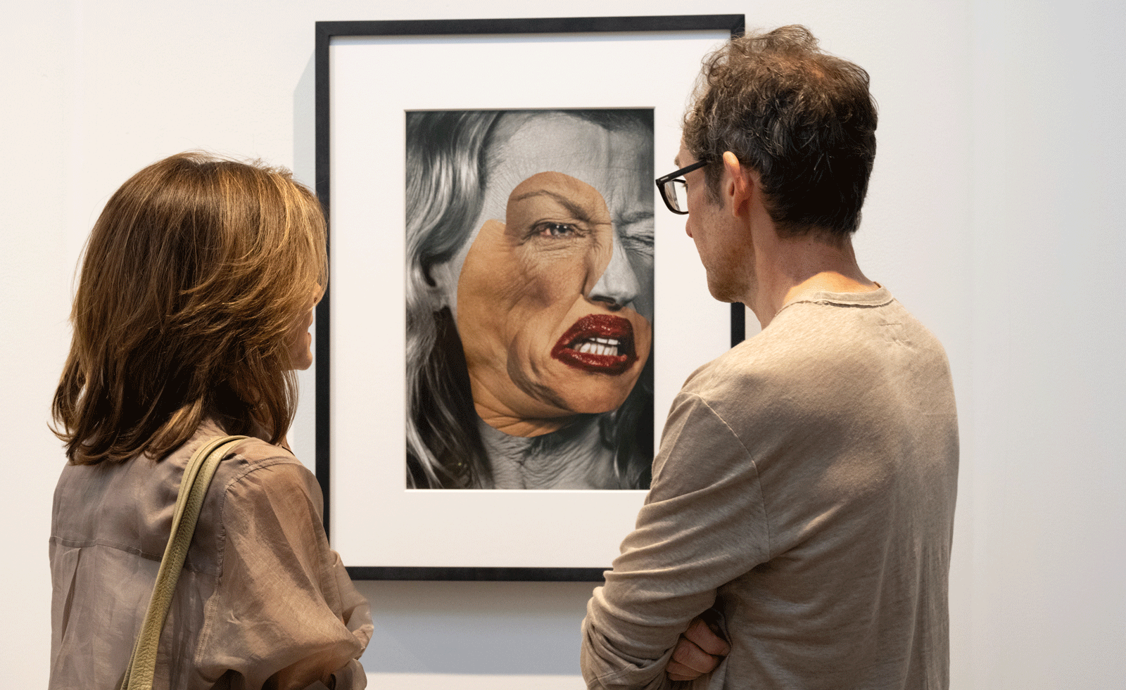 people looking at picture