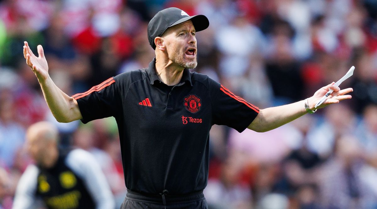 Manchester United manager Erik ten Hag gestures on the touchline during a friendly match