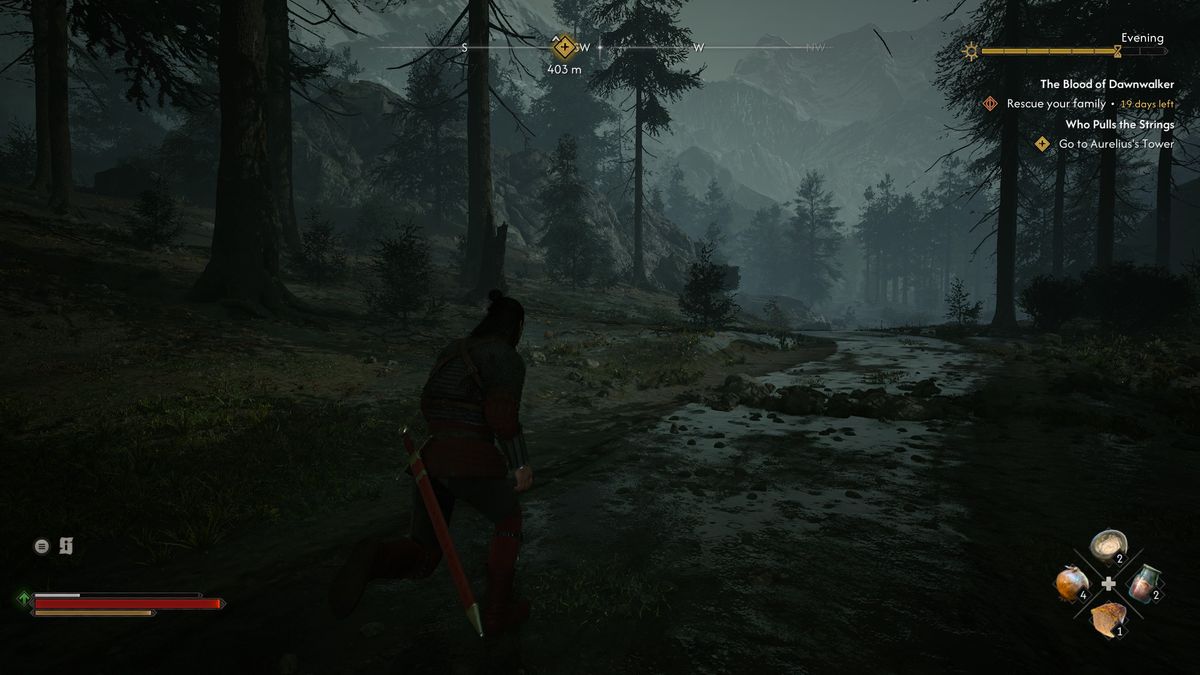 A man walks along a night time forest road