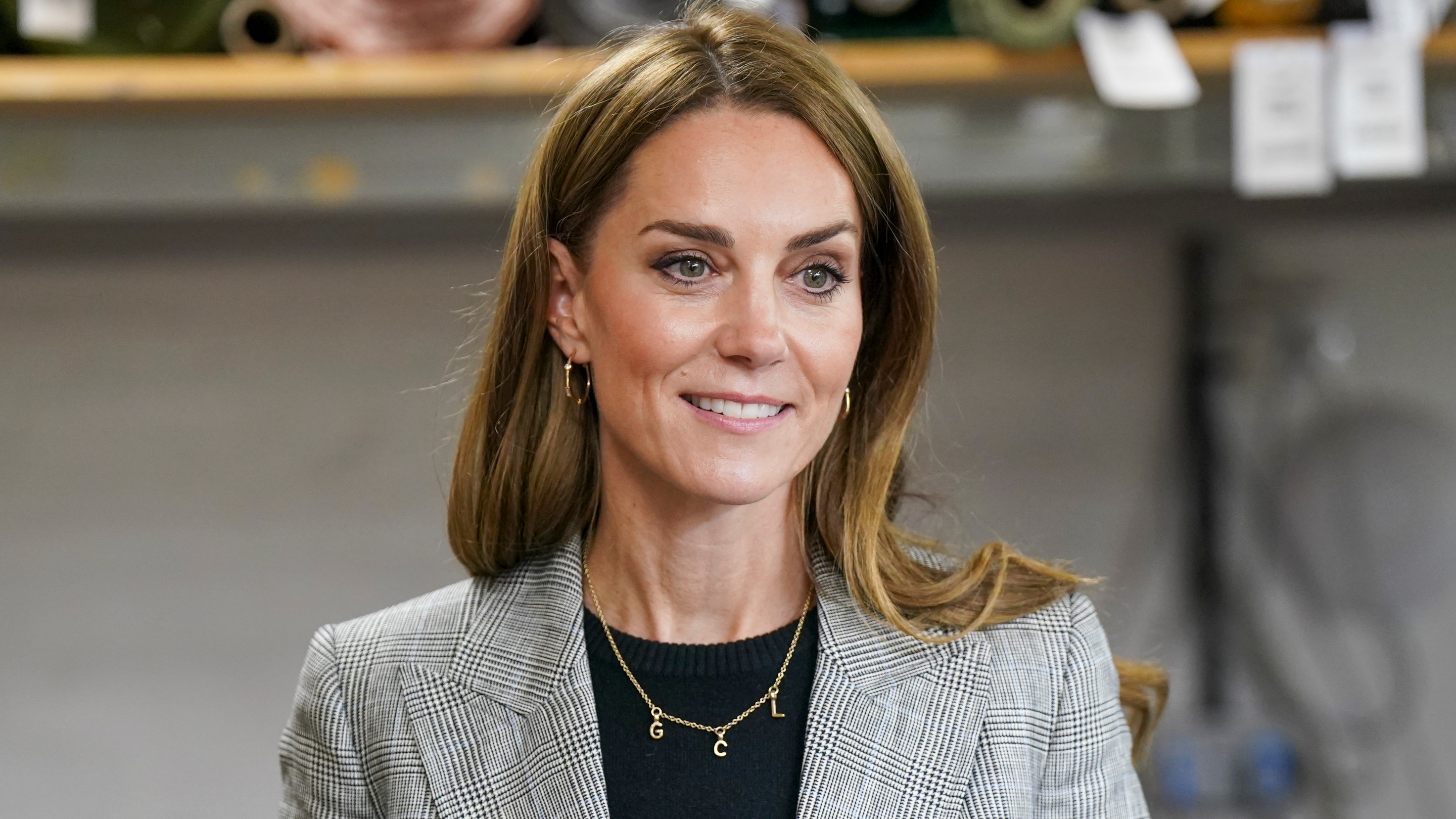 Catherine, Princess of Wales visits Sudbury Silk Mills wearing an initial necklace on September 11, 2025