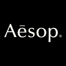 Aesop products on a dark side of the moon setting