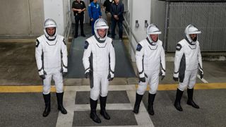 Roscosmos cosmonaut Andrey Fedyaev, NASA astronaut Warren “Woody" Hoburg, second from left, NASA astronaut Stephen Bowen, second from right, and UAE (United Arab Emirates) astronaut Sultan Alneyadi, right, wearing SpaceX spacesuits, are seen as they prepare to depart the Neil A. Armstrong Operations and Checkout Building for Launch Complex 39A during a dress rehearsal prior to the Crew-6 mission launch, Thursday, Feb. 23, 2023, at NASA’s Kennedy Space Center in Florida.