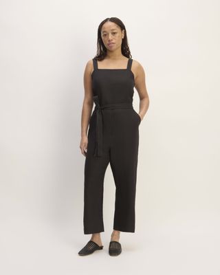 The linen jumpsuit with side buttons