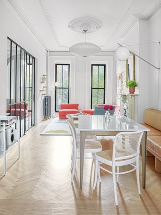 dining room with white chairs