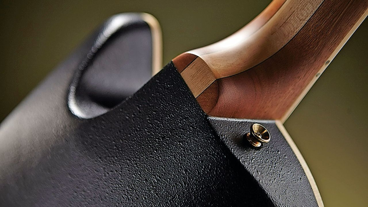 The Deluxe has a larger horn than the 2010 guitar