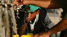 A boy drinking water