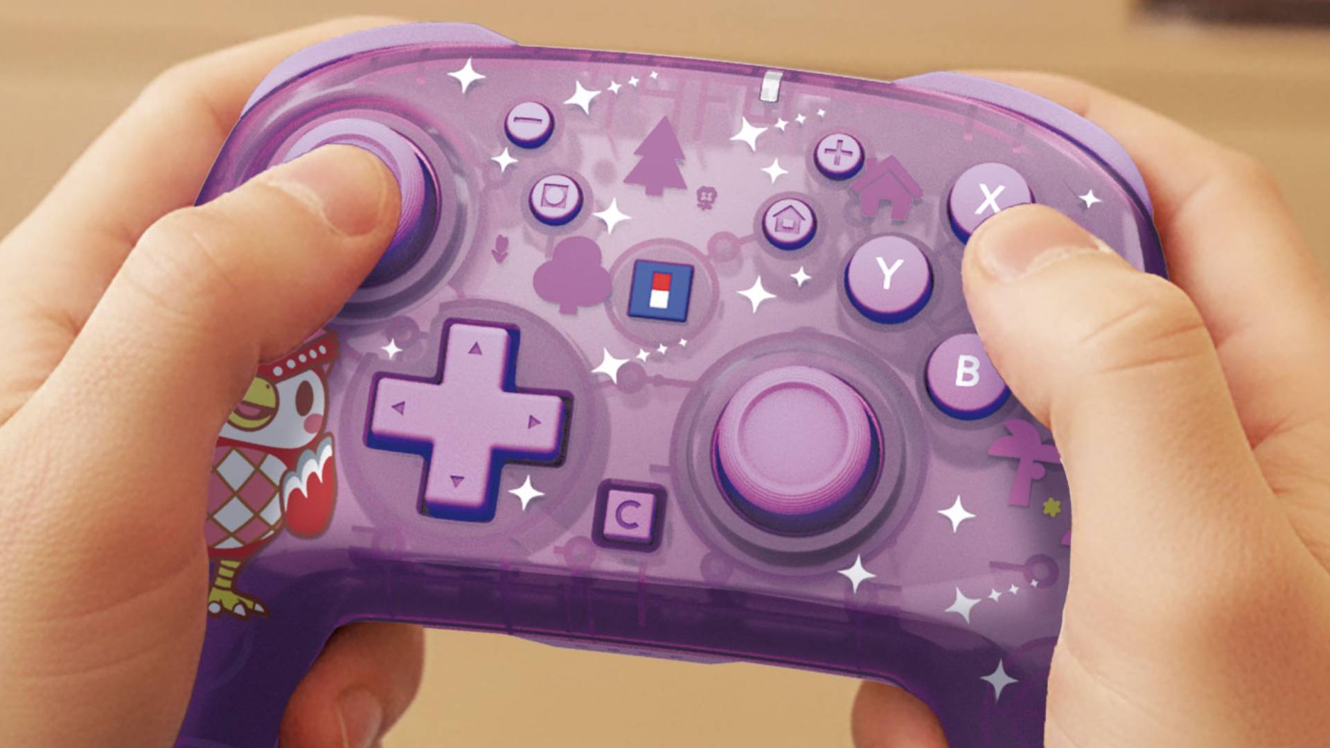Official Hori marketing image showing a hand holding the Celeste and the Starry Night Switch 2 controller.