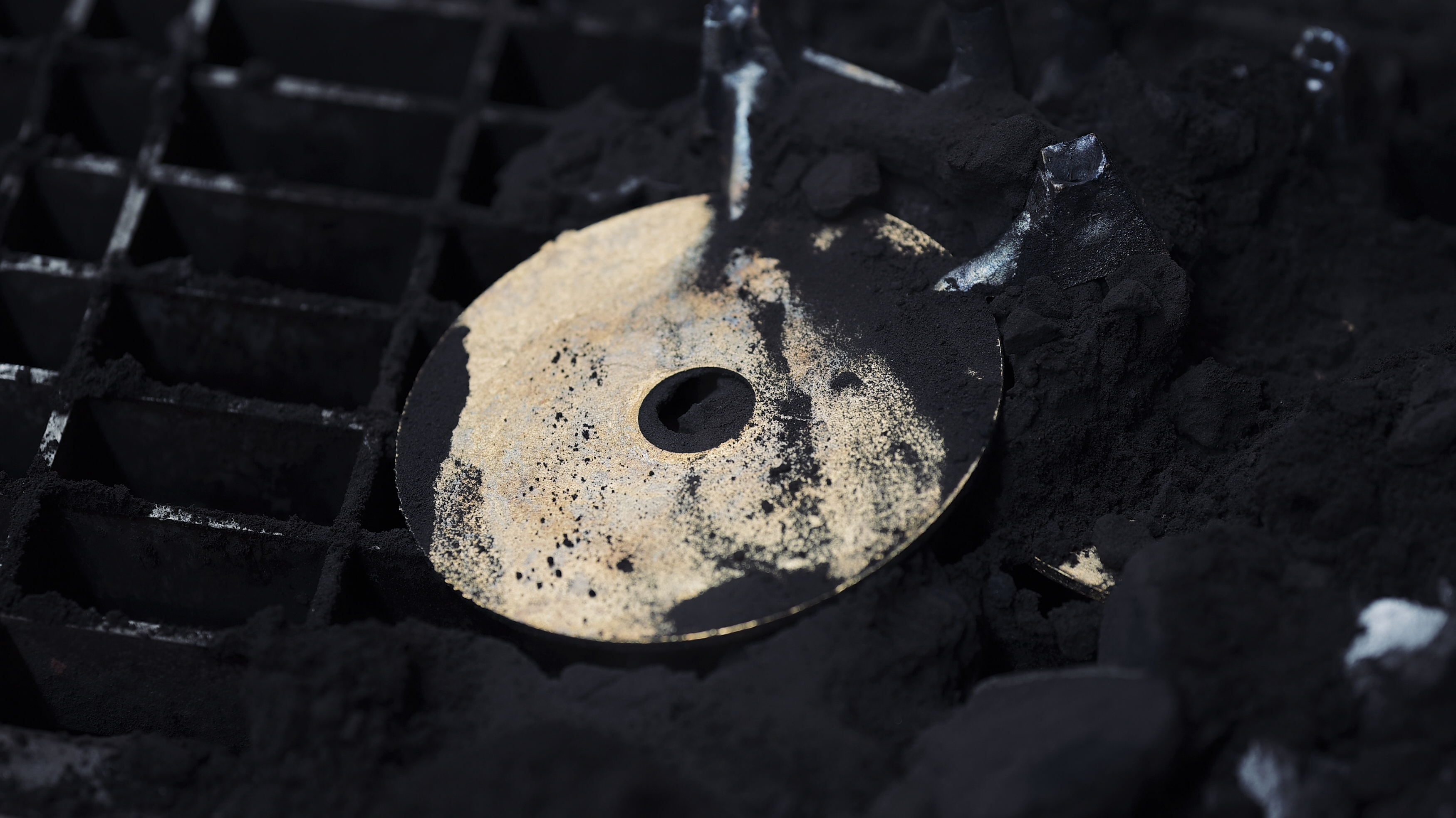 Brass disc in the workshop of New Light Pottery