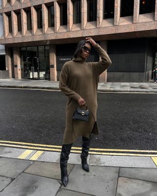 Influencer wears a dress and boots.