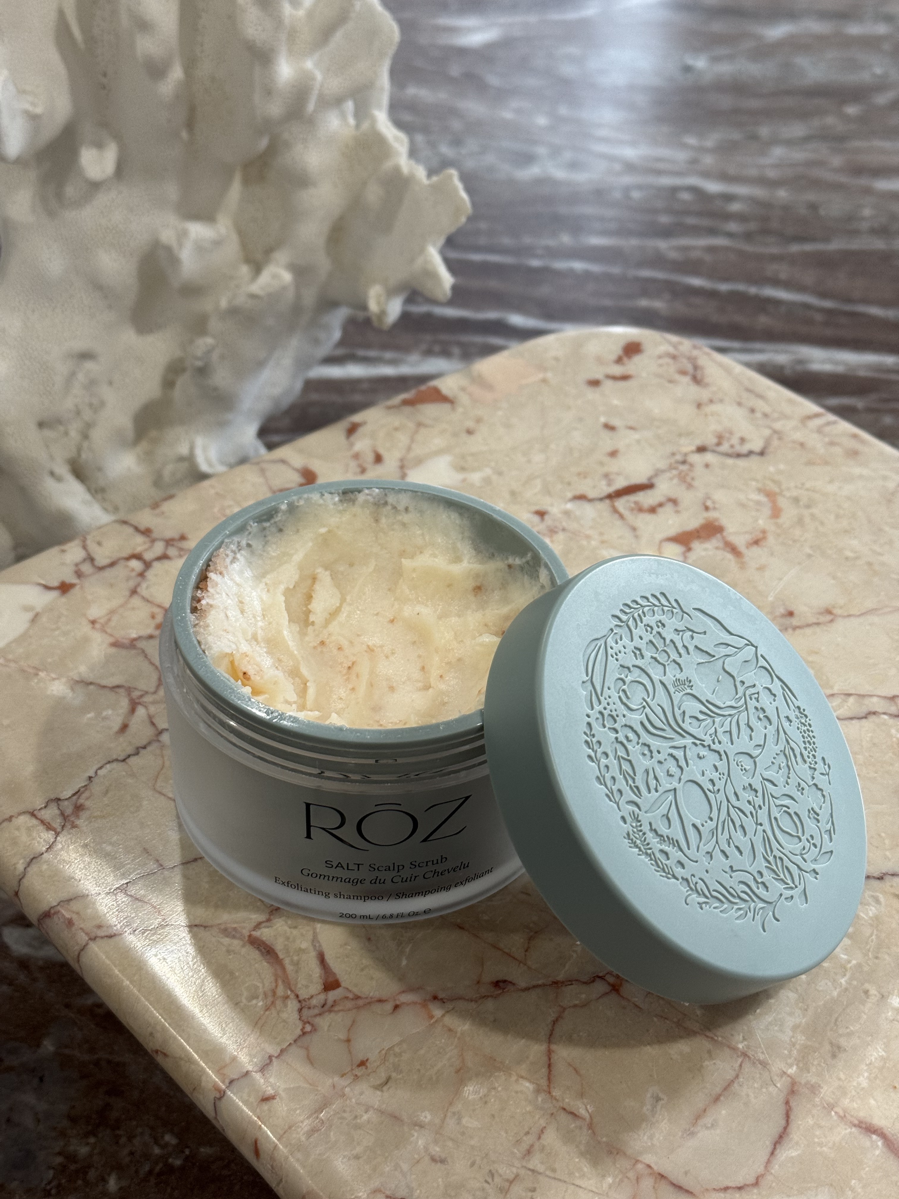 Photo of Jamie Schneider testing the R&amp;#333;z Salt Scalp Scrub