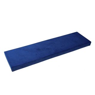 A dark blue rectangular velvet seat cushion