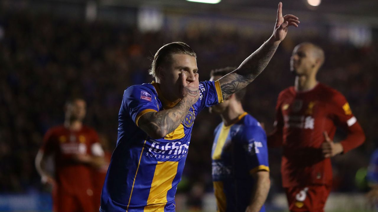 Shrewsbury Town’s Jason Cummings celebrates his first goal against Liverpool 