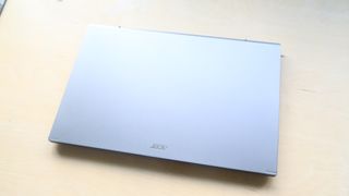 Acer Aspire 5 laptop on a wooden surface