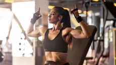 Woman training in gym to build muscle