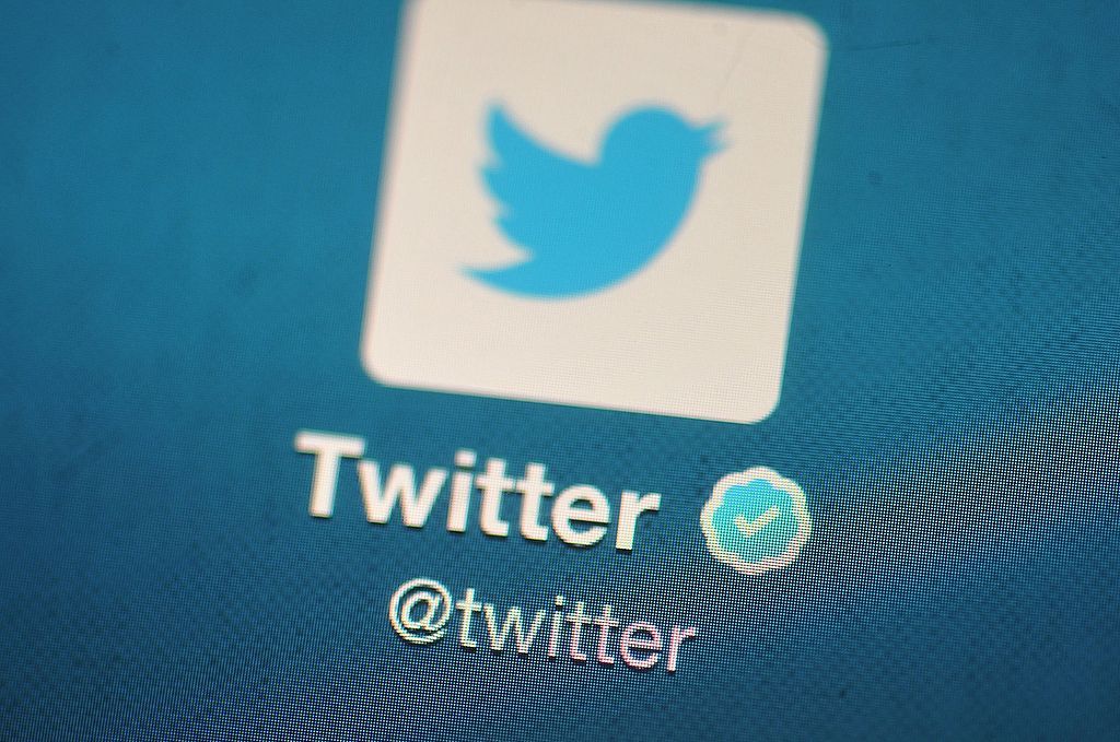 In this photo illustration, The Twitter logo is displayed on a mobile device as the company announced it&amp;#039;s initial public offering and debut on the New York Stock Exchange on November 7, 2013