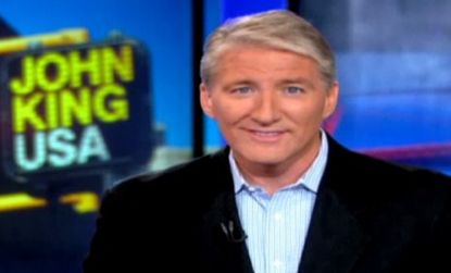 John King, the man behind the "Magic Wall," takes Lou Dobbs's place on CNN.