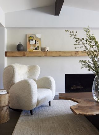 a living room with a white chair