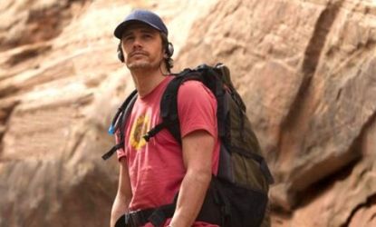 James Franco plays climber Aron Ralston who said the Utah park personnel recovered his hand six months later and had it cremated at his request.