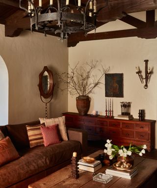 Rustic living room with wooden beams and wooden furniture