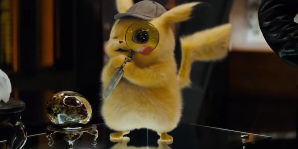 Pikachu holding magnifying glass