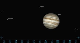 In binoculars or a small telescope, Jupiter's four largest moons ― Io, Europa, Ganymede and Callisto― become visible to either side of the planet. Their positions change nightly. A larger telescope will show the brown equatorial bands around the planet. And a good telescope will let you see the Great Red Spot. Jupiter's 10-hour rotation period causes the spot to be visible for only a few hours at a time, roughly every second evening. Use your astronomy app to find out when to look for it.