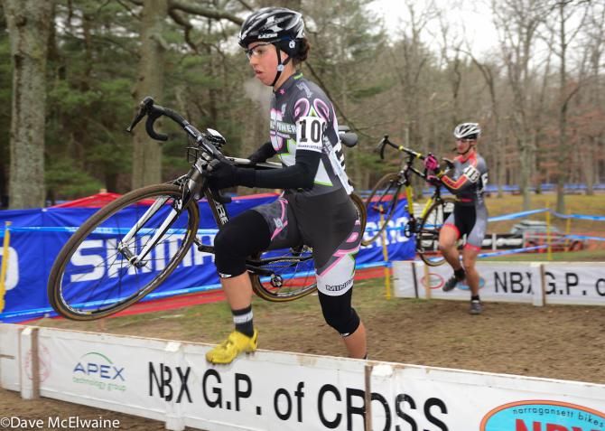 Anna Barensfeld (PedalPowerTraining.com) sprinting over the barriers.