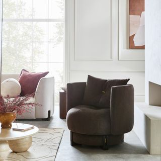 DFS Ted Baker Grove Swivel Accent Chair in Mocha in a minimalist living room