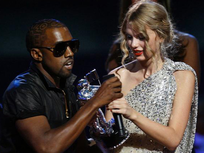 West yanks the award and mic from a shaken Swift