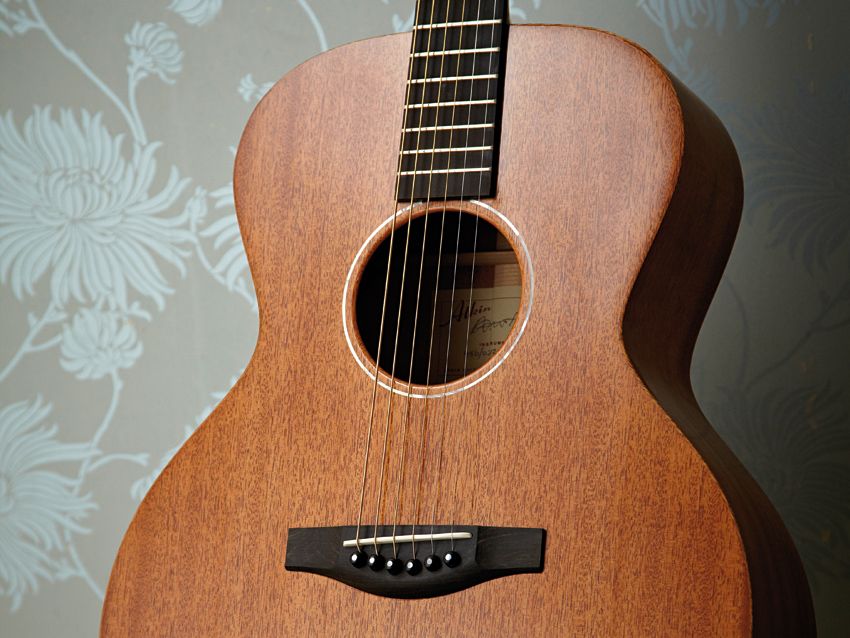 The Atkin AA AM Special's narrow pearl soundhole ring tops off a subtle aesthetic approach.