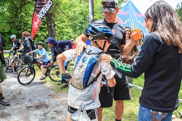 11-year-old - that's right, 11 year old - Tanner Davis finished every stage of TSEpic as part of the CO/VA Connection Epic Team and if he can do it so can you! Here he is congratulated by his folks, pop John won the Masters 40 competition.