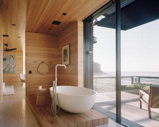 A bathroom with a freestanding tub