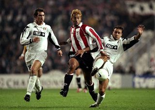 Ismael Urzaia of Athletic Bilboa takes on Alessandro Birindelli of Juventus during the UEFA Champions League match at the San Mames Stadium in Bilboa, Spain.