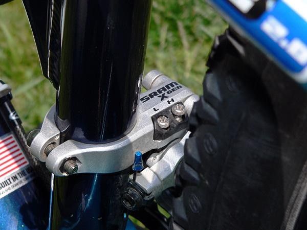 SRAM handles front shifting duties as well with its X-Gen front derailleur. Check out the anodized aluminum cable end cap.