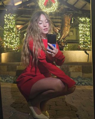 Sydney Sweeney wearing a red outfit on Instagram