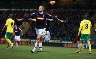 Scott Rendell celebrates after scoring Luton Town's winning goal against Norwich City in the FA Cup, 2013