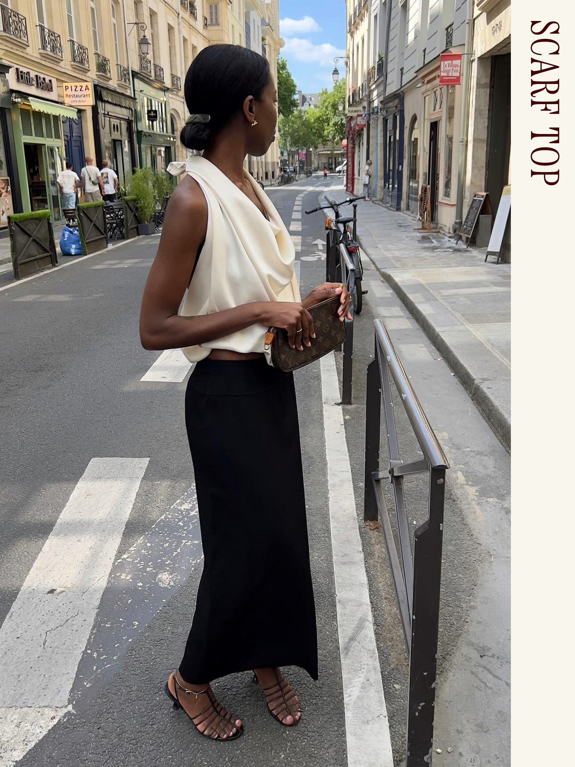 Influencer wearing a white scarf top, black maxi skirt, and sandals