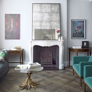 living room with white wall and frame on wall