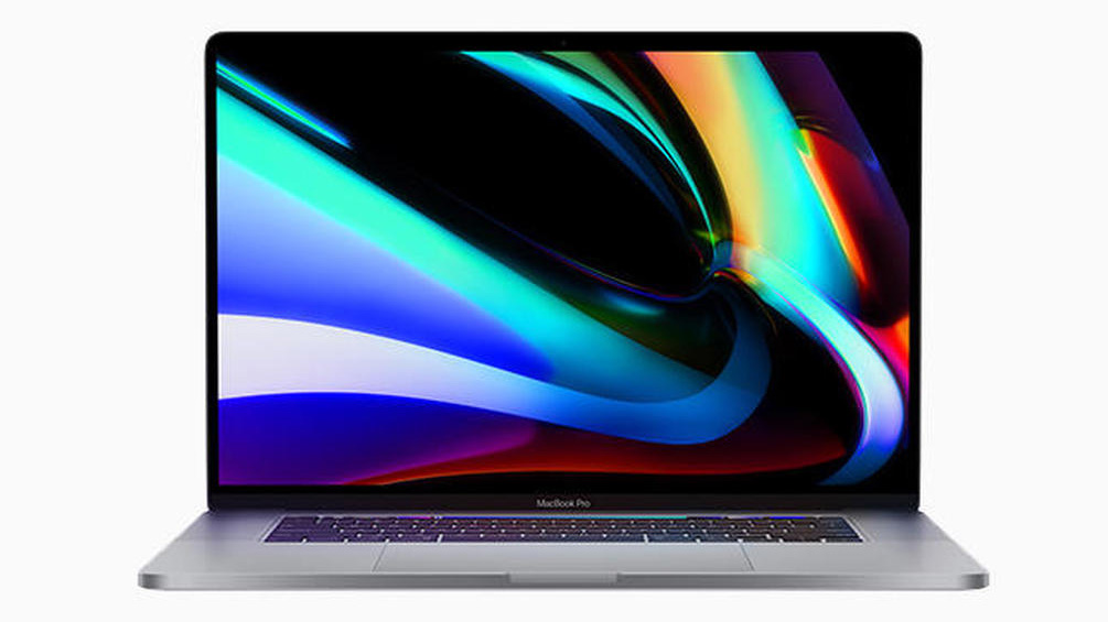 MacBook Pro 16-inch with the screen open showing a desktop wallpaper