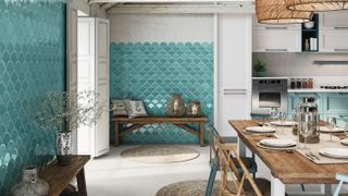 turquoise fan shaped wall tiles in kitchen diner