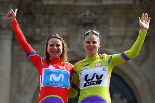SANTIAGO DE COMPOSTELA SPAIN SEPTEMBER 05 LR Annemiek Van Vleuten of Netherlands and Movistar Team red leader jersey and Lotte Kopecky of Belgium and Team Liv Racing green points jersey celebrate winning on the podium ceremony after during the 7th Ceratizit Challenge By La Vuelta 2021 Stage 4 a 1074 km at stage from As Pontes to Santiago de Compostela ChallengeVuelta CERATIZITChallenge21 on September 05 2021 in Santiago de Compostela Spain Photo by Stuart FranklinGetty Images