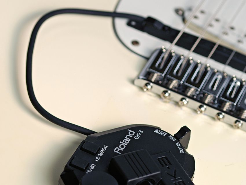 The hex pickup is easily attached to your guitar of choice.