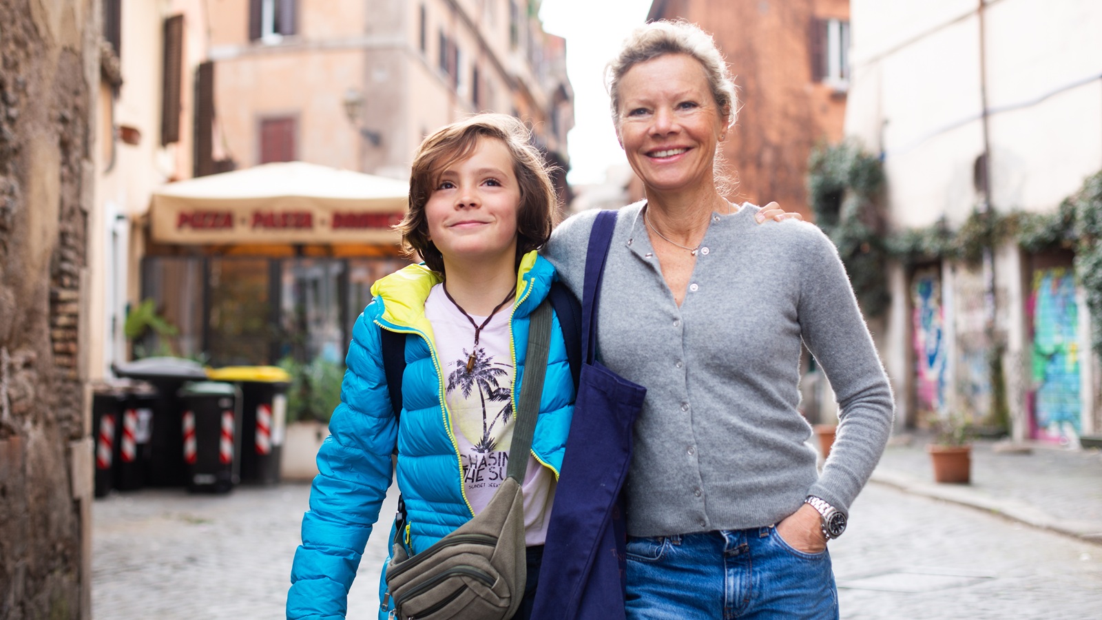 A mother and son tourists in Italy.