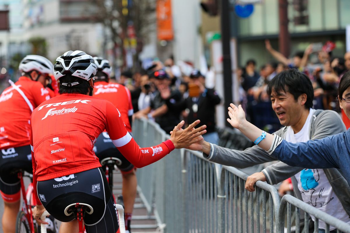 High-fiving fans