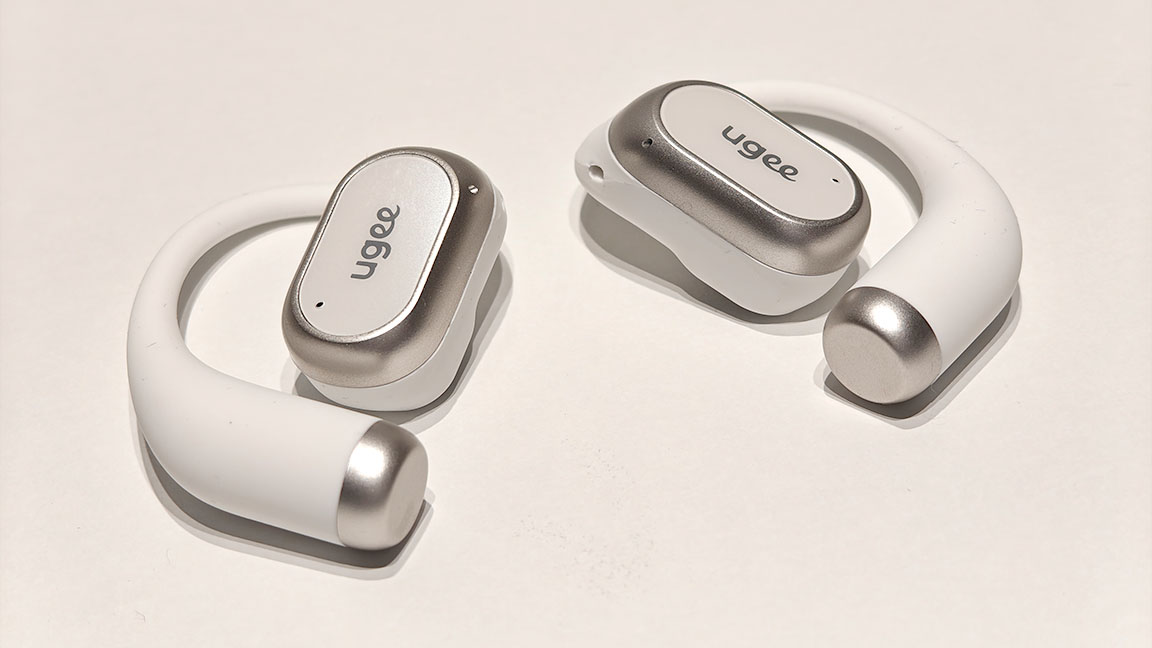 Ugee FreSound; open earbuds on a white table