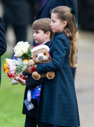 Kate Middleton wears forest green to attend church on Christmas Day in Sandringham with her family, including daughter Princess Charlotte, who wore her hair the same as her mom